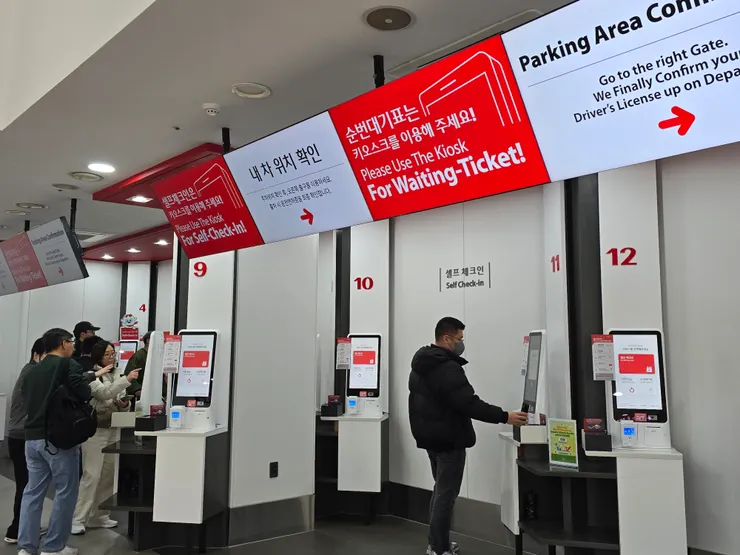 先到報到機報到取號