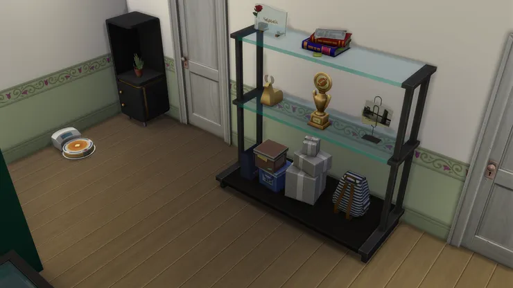 雖然想過這麼大的架子放在兩扇門中間會不會太大和不協調，但因為是玻璃架，加上空間夠，看起來也不錯。