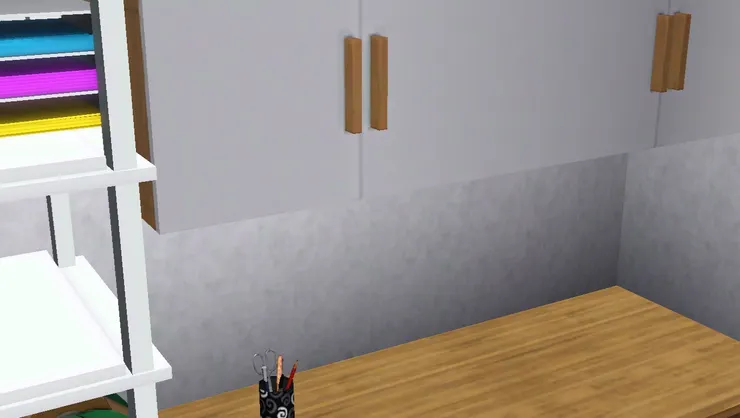 這個員工辦公室很可惜沒有員工儲物櫃，他們的個人物品只能放在這個掛牆櫃裏。