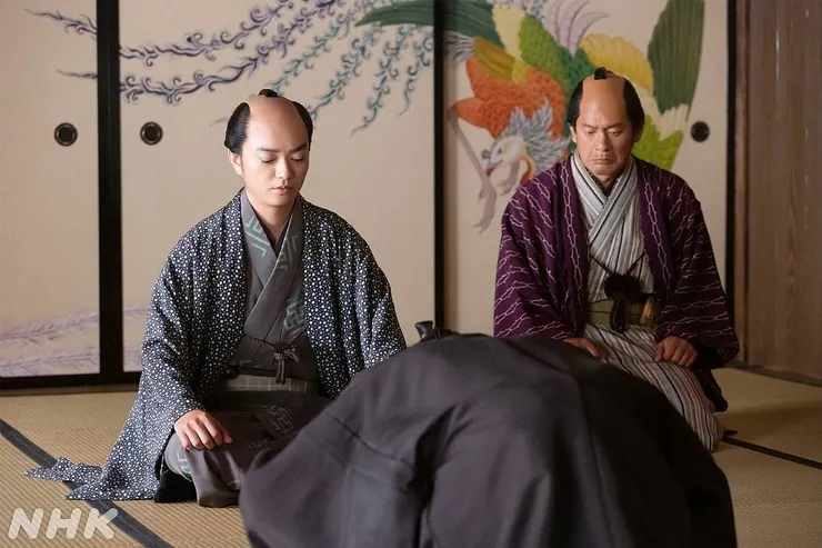 蔦重低頭懇請歌麿答應這次合作