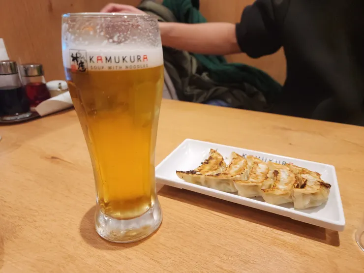 來杯生啤加煎餃