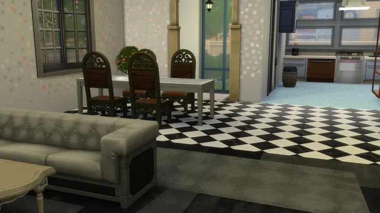 看材質的話，客廳應該是鋪了地氈，而飯廳是黑白大理石。我很喜歡這款像棋盤的。