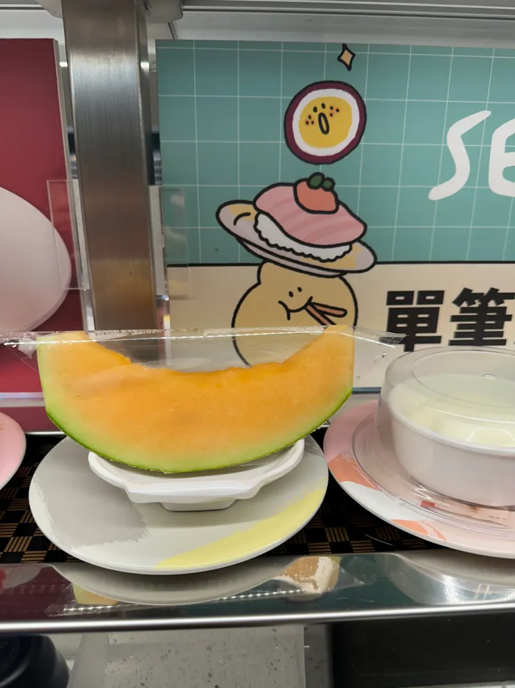 哈密瓜，兒子吃兩塊