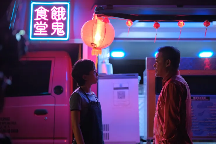 圖右為片中飾演舅舅的張咏華