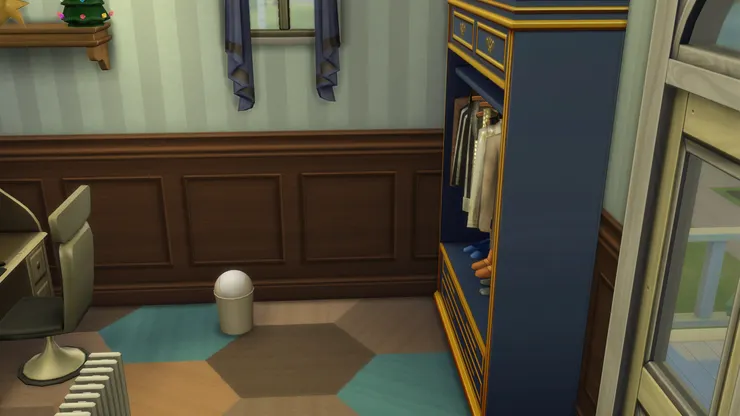 主人房以露台的門為分界線，前一半為書房和衣帽間。