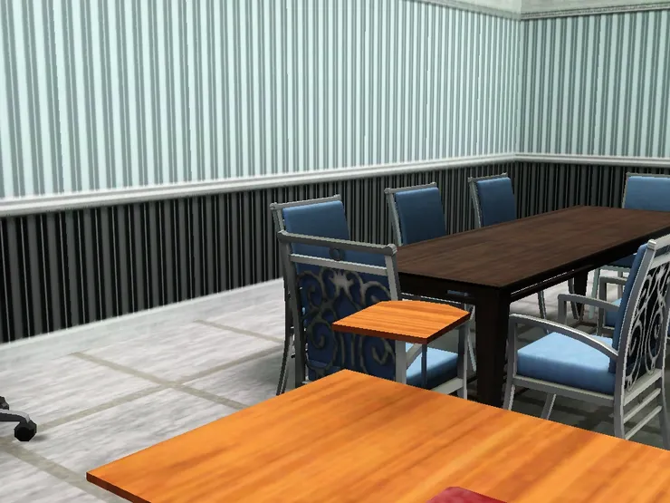 從電腦桌看著人們開會。