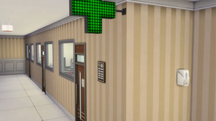 教員室旁是另一個房間，看到標誌便猜到是什麼吧。