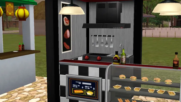 這廚房當然跟其他攤檔不同，有的是煎爐而不是大鍋。