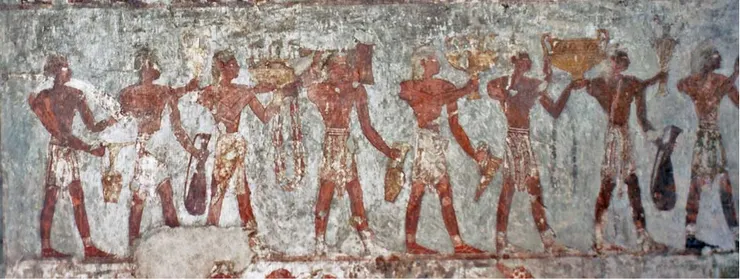 Detail of Keftiu from TT100, Tomb of Rekhmire.[46] Original photo via Osirisnet.“The chiefs of the islands in the midst of the Great Green come, bearing their gifts, bowing down, to beg breath for their nostrils from the majesty of His Majesty.”