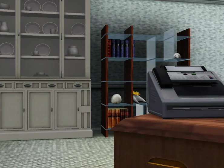 一旁有書架和展示櫃。