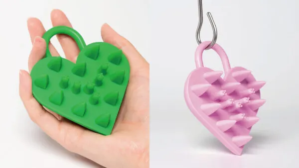 SINN PURETÉ 心樸優 愛心鎖頭皮按摩梳。圖/SINN PURETÉ 心樸優提供