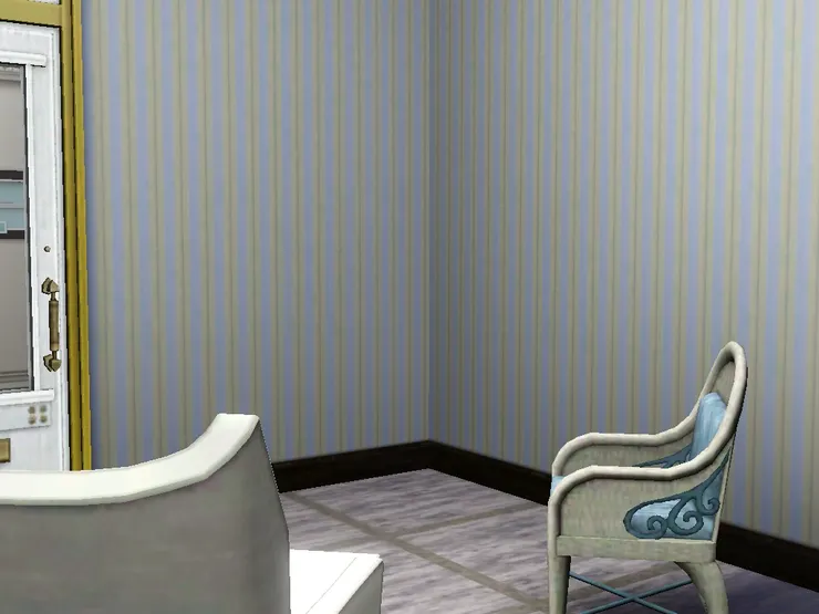 一邊有一張扶手藤椅。