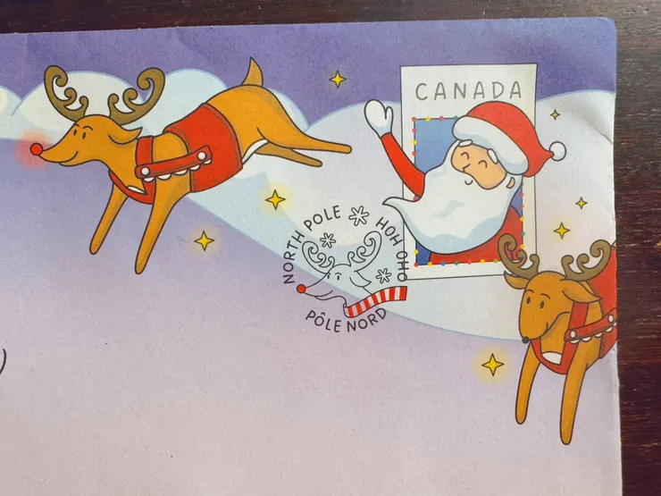 加拿大聖誕老公公的回信郵戳，好可愛啊！