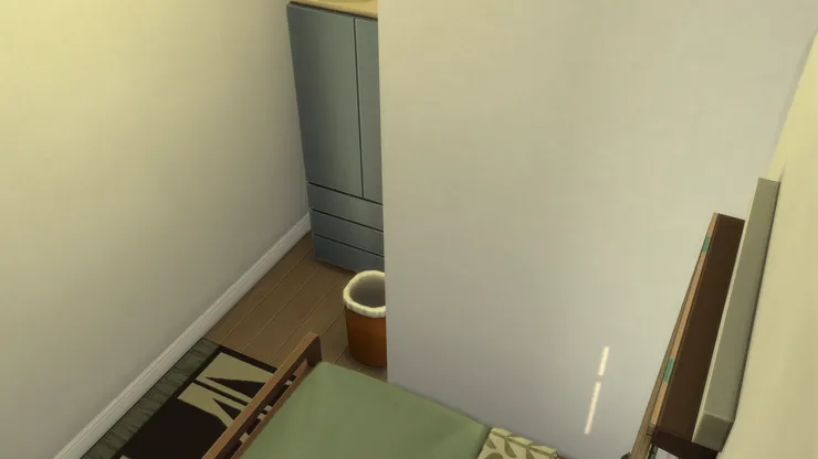 這房間的牆我只用了清水的白色。大麥可說睡覺的地方沒必要花巧。