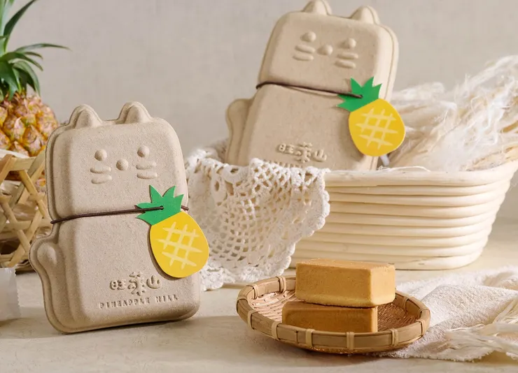 圖說：貓咪造型的禮盒，以鳳梨葉中的天然鳳梨纖維與再生紙漿製作而成，享受美味鳳梨酥同時也為環境永續盡一份心力。（資料來源：旺萊山）