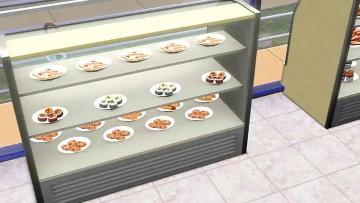 我盡量分門別類來擺放，這個展示櫃放的是糕點甜品。