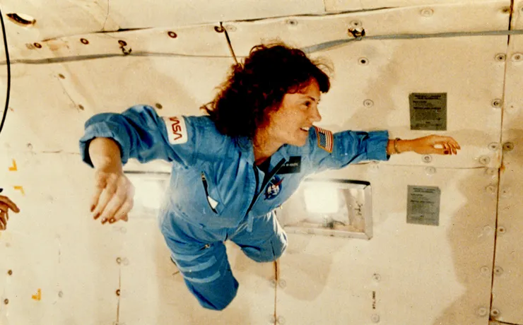 McAuliffe undergoing pre-flight training experiences weightlessness during a KC-135 "vomit comet" flight