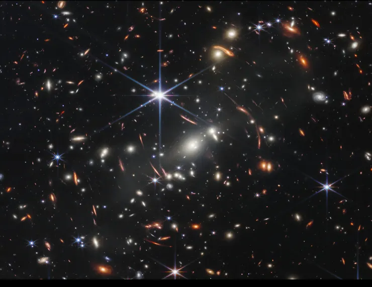 這些影像，來自詹姆斯・韋伯太空望遠鏡對深空的觀測。 它們並非肉眼所見，而是紅外線資料經過轉譯與上色後的結果。