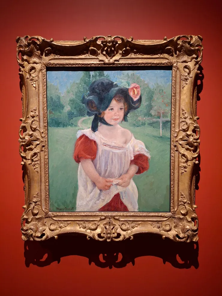 這可愛的小孩是畫家的鄰居