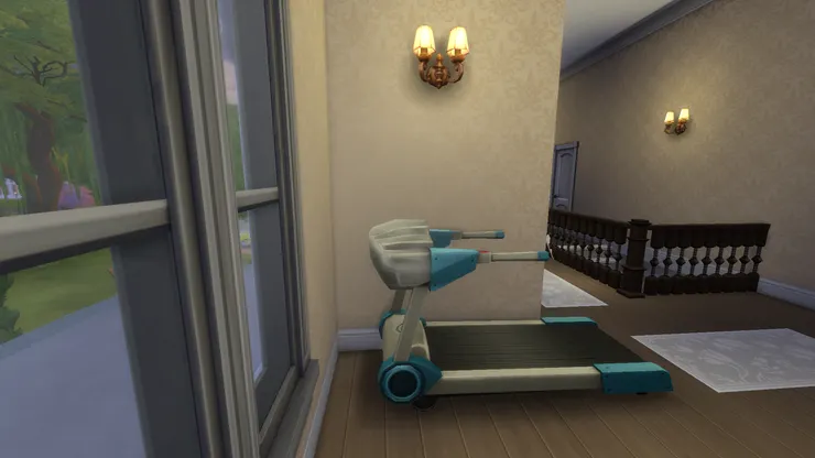 這是另一個房子了。記得沒有一個房間放得下跑步機，便放在二樓的公共區域了。