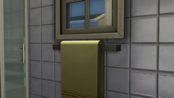 浴巾就掛在淋浴間外面，一洗好便隨手拿到。