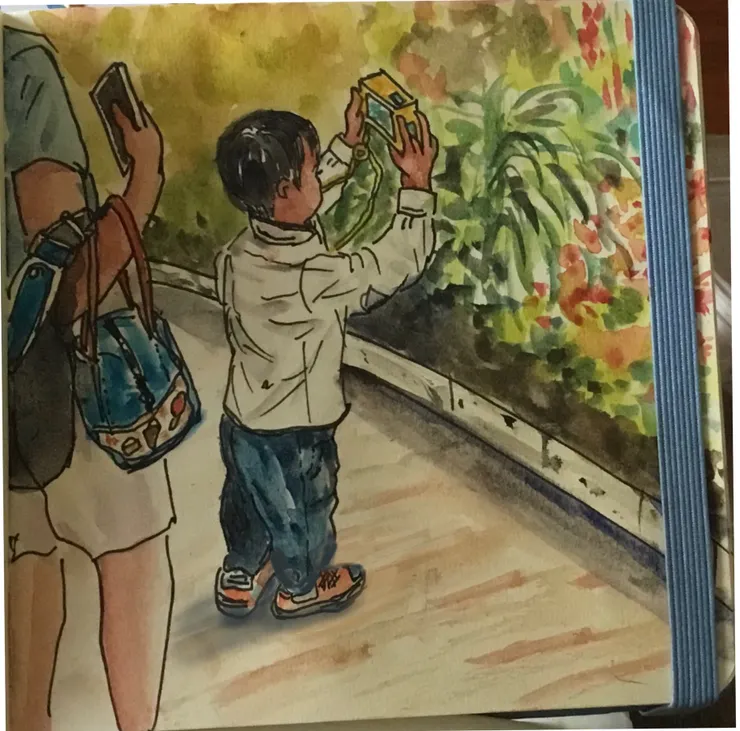 濱海灣花園忙取景的小小攝影師