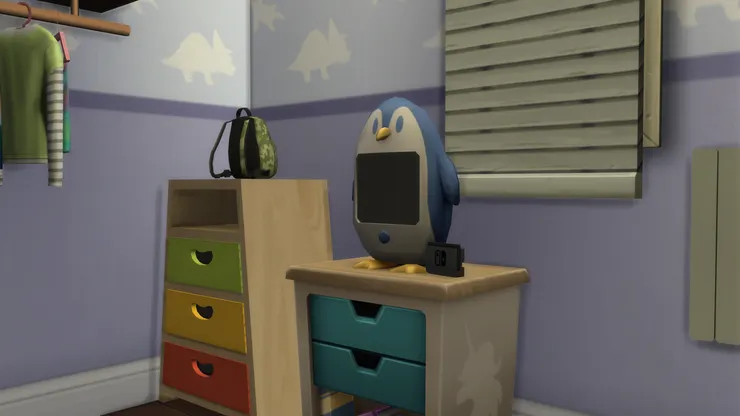 這紫藍色的企鵝電視可說是跟這房間絕配，不但顏色，也符合男孩的年紀。(如果真有這台電視我也想要。)