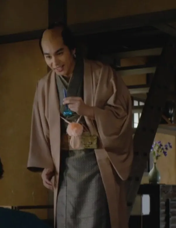 次郎兵衛手中的藍色玻璃ぽぴん