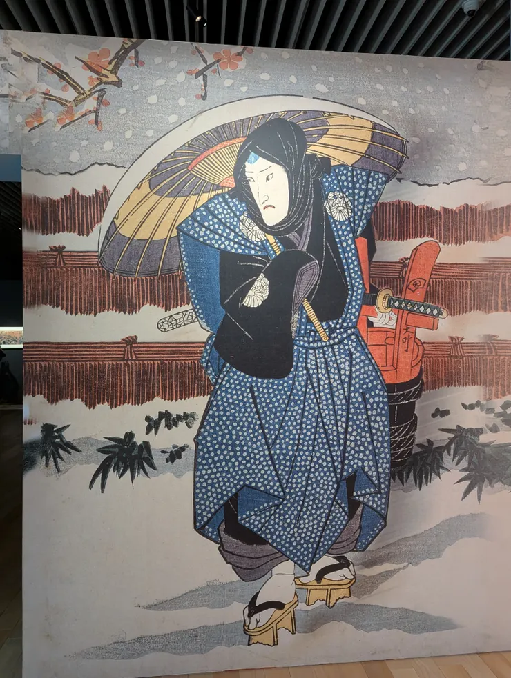 牆上的放大圖繪（歌川豐國繪）