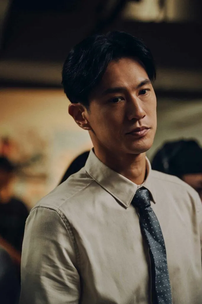 在《無罪推定》中，鍾承翰飾人權律師陳至謙。（圖／《無罪推定》）