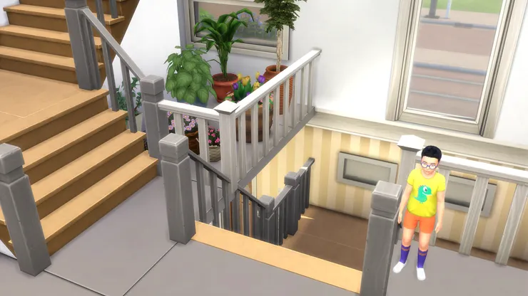 從地下層的樓梯上來便是一樓，而一樓當然也有樓梯到二樓。