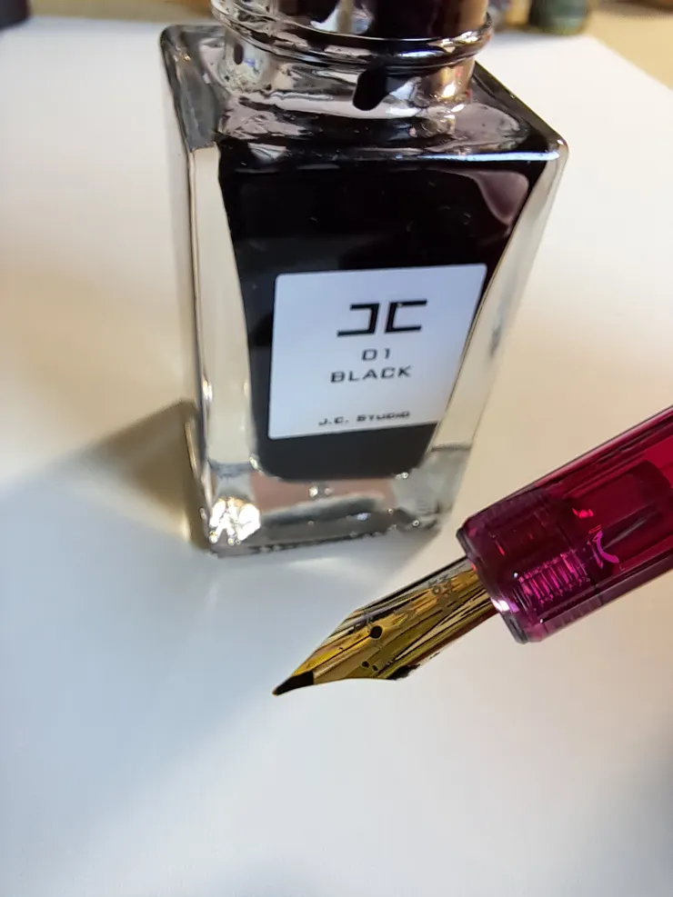 確定筆尖圓圈有吸進墨水