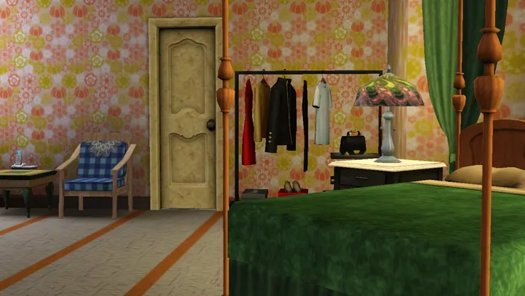 房門口、sitting area、衣架和大床。