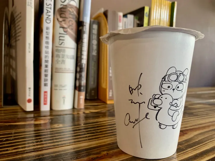 咖啡杯上老闆的手繪圖