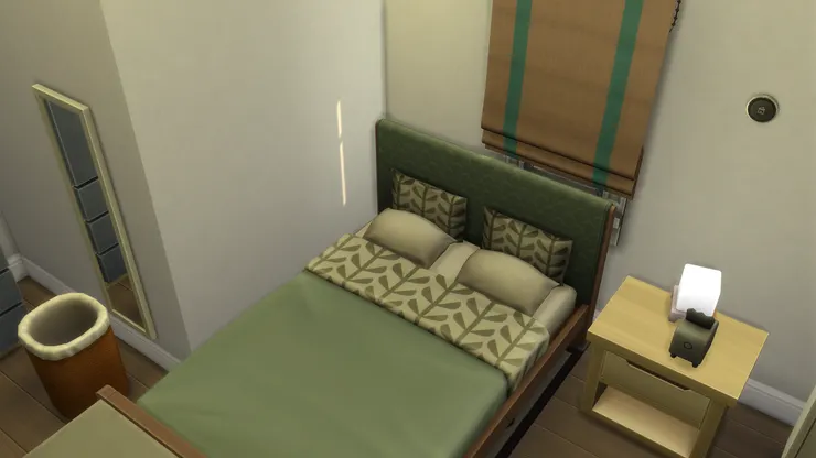 雖然不是故意,但窗簾跟床鋪的顏色很相配。這種簡單的田園感覺運用在睡房很是舒適。