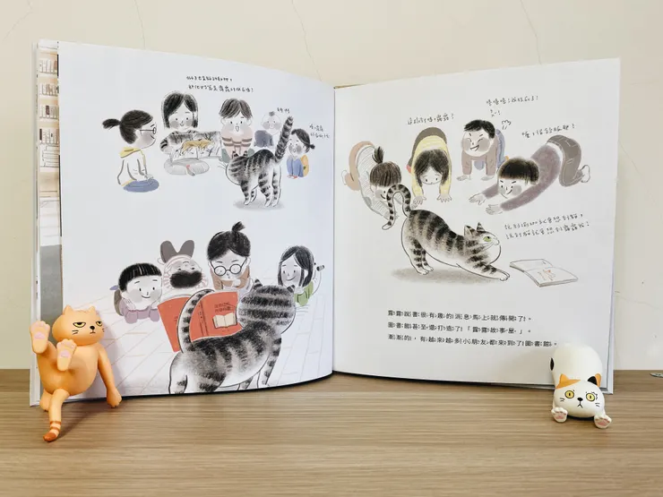 用貓尾捲書太可愛了