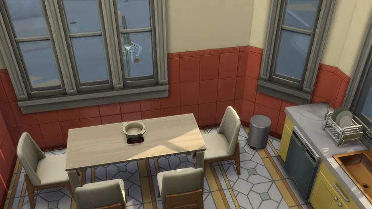 垃圾桶只好縮在一旁,小心餐椅會撞到。