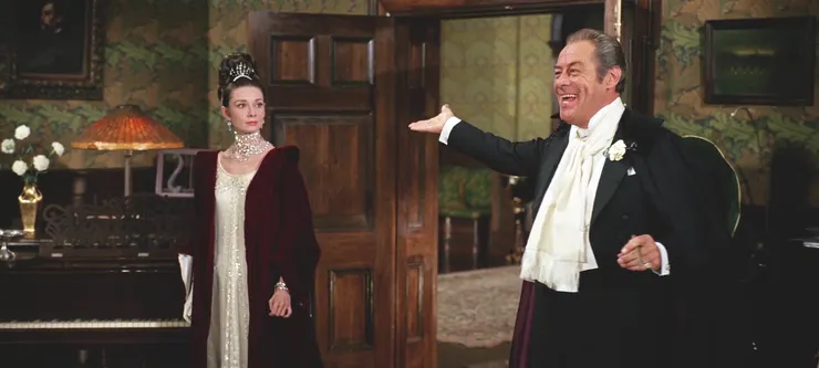 希金斯向僕人吹噓自己的成果，忽略一旁的伊萊莎