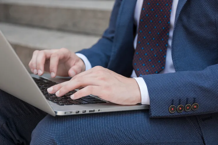 businessman typing laptop keyboard