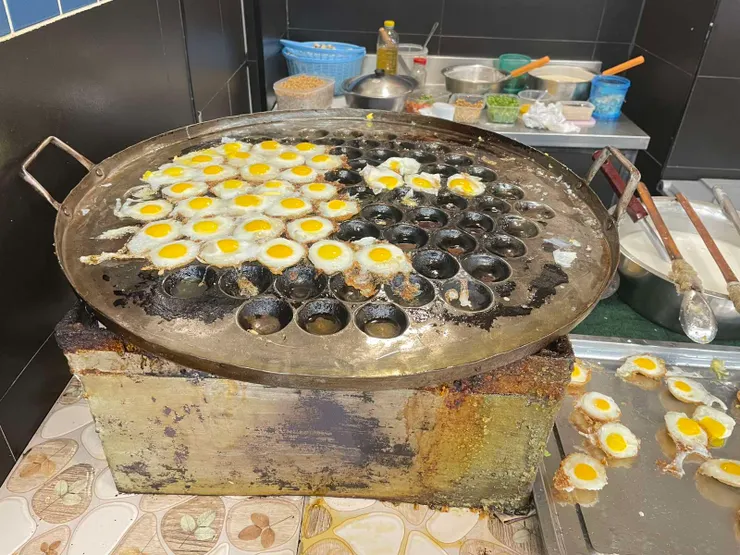 煎夫妻粑粑的鍋(這是的超市美食節拍的照片)