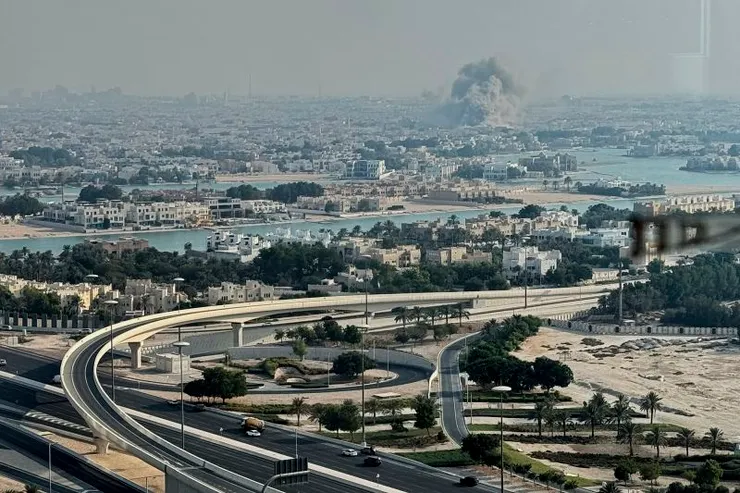 Smoke rises from an explosion, after an Israeli strike on the Qatari capital, Doha, on September 9. UGC/AP