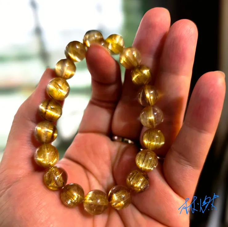 貓眼鈦晶–林燃收藏，另外兩張是紅銅鈦