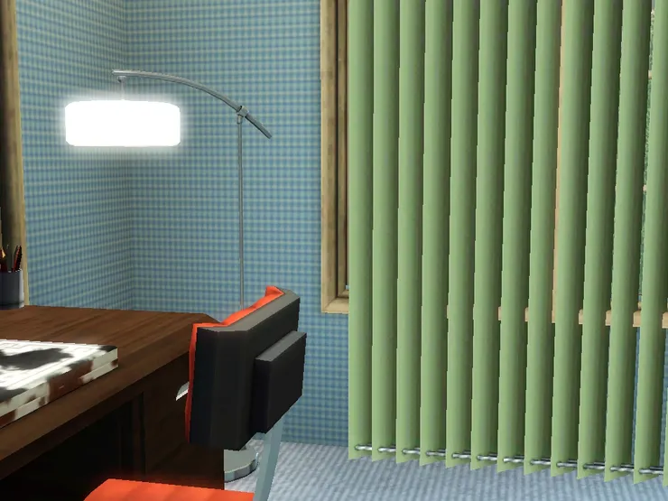 這裏的面積是兩個房間大，所以一邊用來工作或看電視，另一邊用來睡覺。