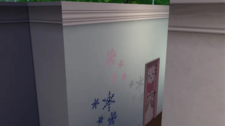 走廊的牆上我貼了雪花圖案，充滿冬日氣息。