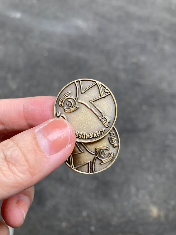 可愛的金幣門票！一枚可以抵消費100元喔