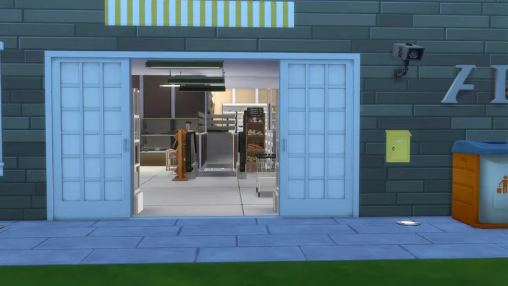 終於到達門口了！現實的店門口有一道斜台，方便運貨，可惜我沒能力畫出來。