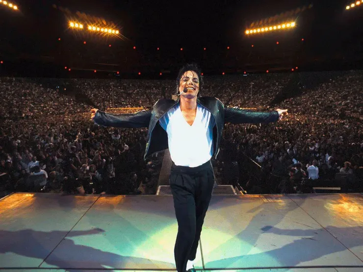 麥可傑克森在「歷史之旅」演唱會中表演〈Heal the World〉/攝影師:John Isaac