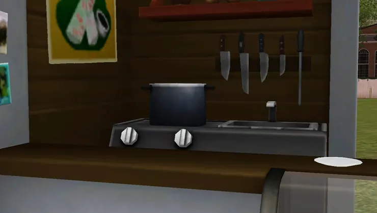 裏面的煮食位置有大鍋、菜刀和洗手盆，設備一應俱全。