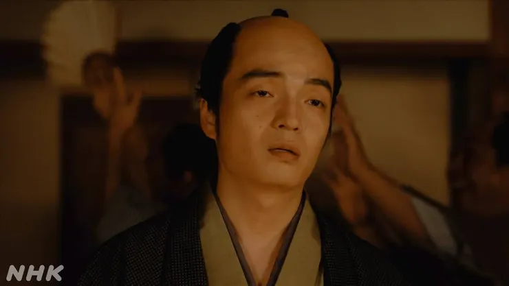 在宴會中面如死灰的春町