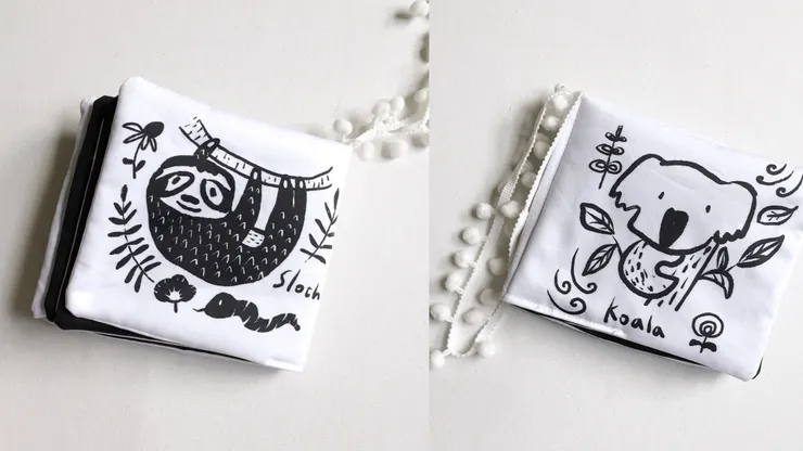 肯妮為女兒做的黑白動物布書深受英國出版社喜愛，更促成後續的硬頁書合作。